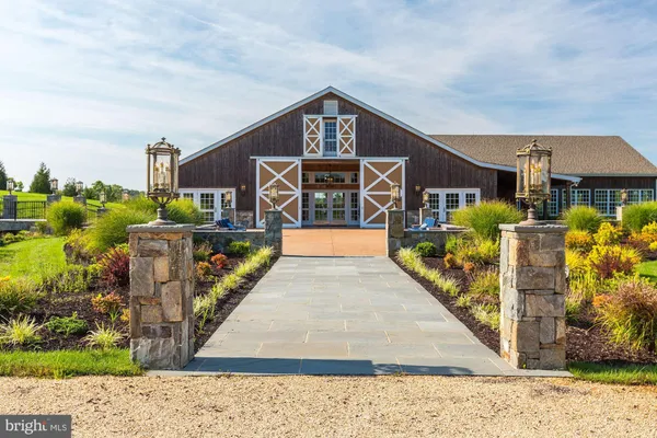 an aerial view of a house with a garden