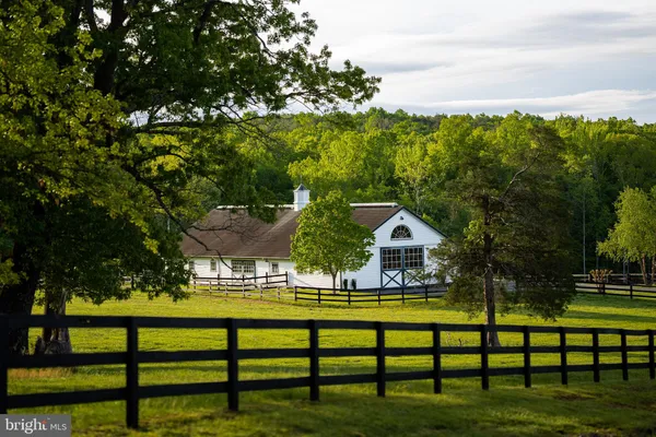 a view of a lake with a big yard
