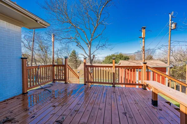 a view of deck with furniture and wooden floor