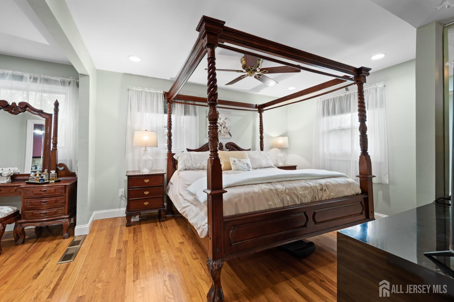 13 Fishel Road Edison, NJ 08820 - Photo 12 of 31 a bedroom with a bed and wooden floor