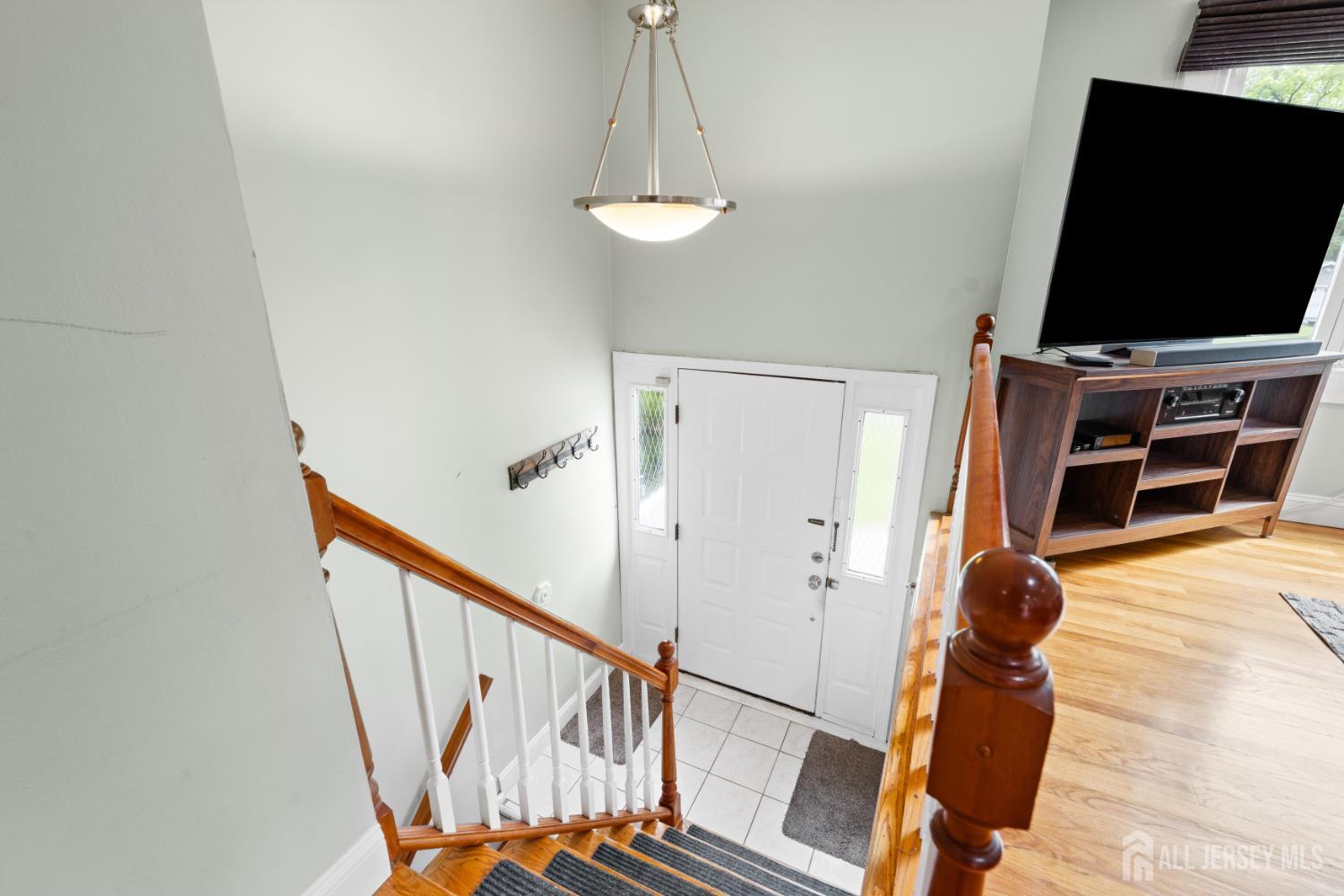 13 Fishel Road Edison, NJ 08820 - Photo 17 of 31 a view of a room with wooden floor and windows