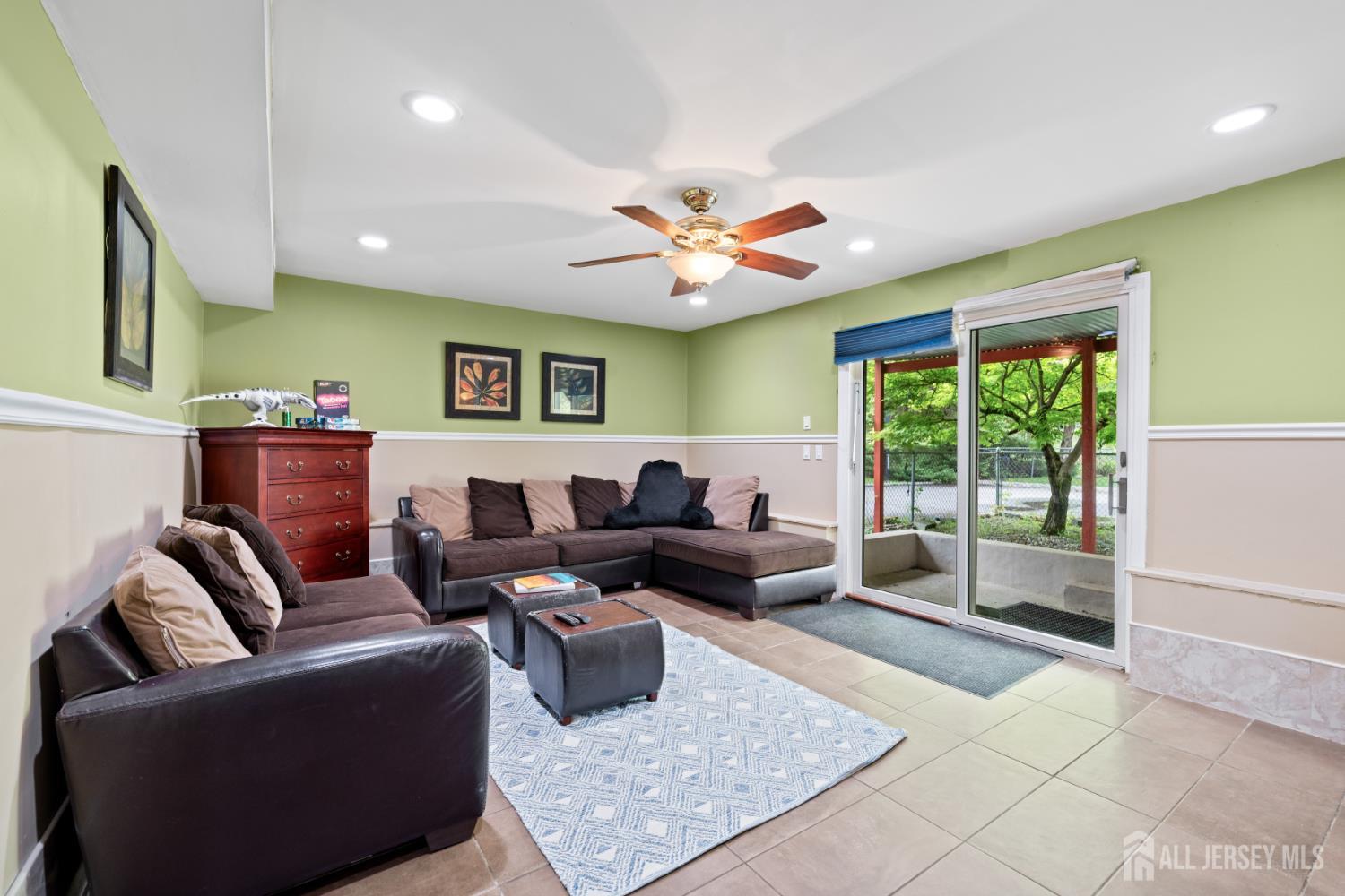 13 Fishel Road Edison, NJ 08820 - Photo 18 of 31 a living room with furniture and a large window