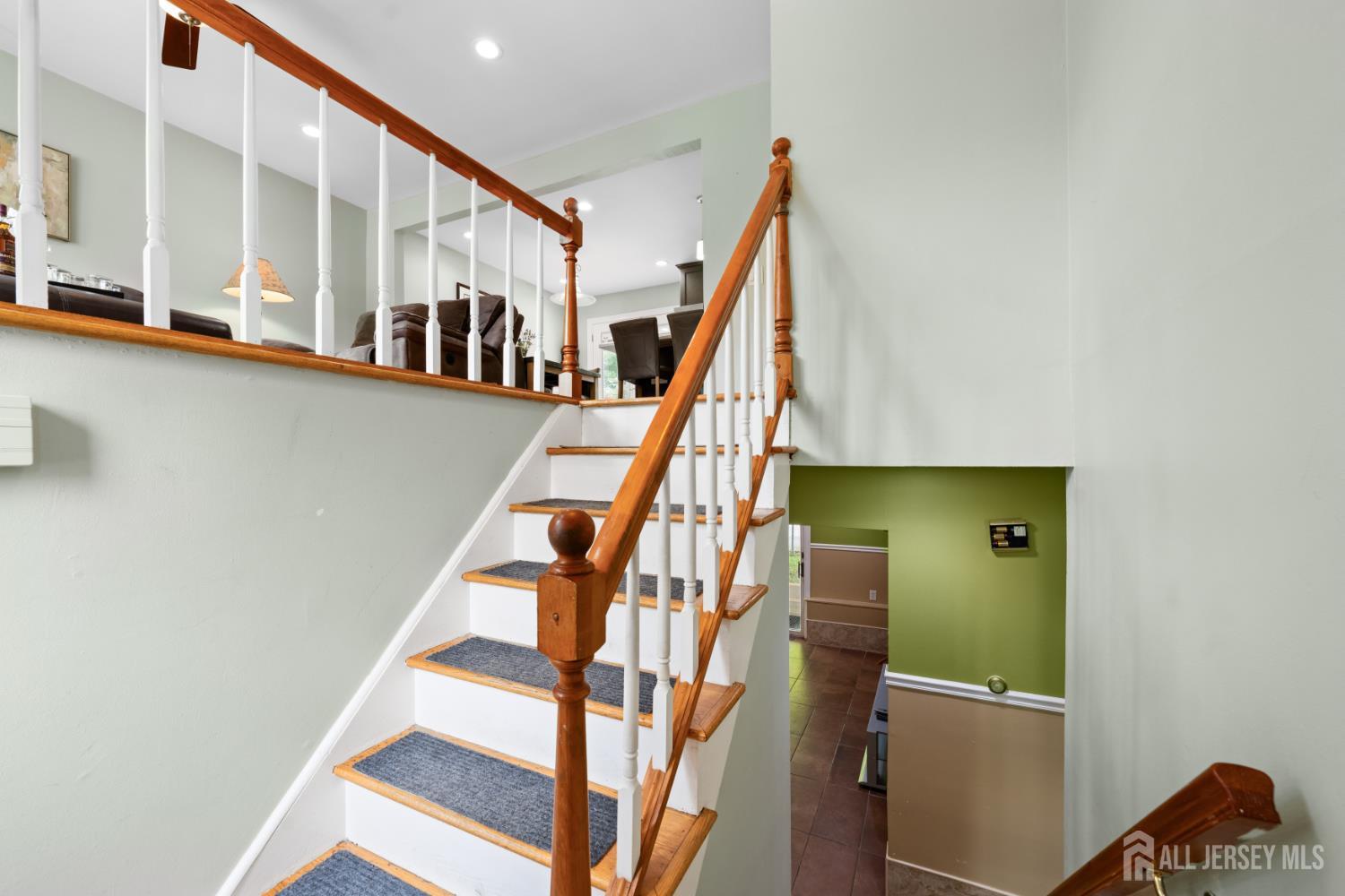 13 Fishel Road Edison, NJ 08820 - Photo 2 of 31 a view of entryway with wooden floor and stairs