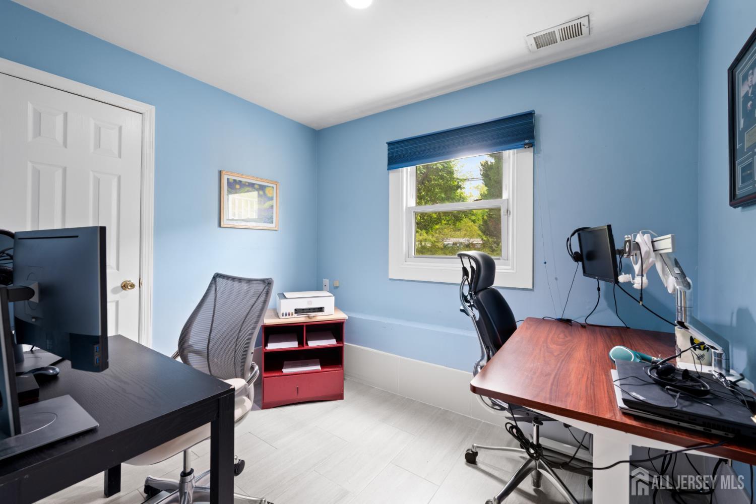 13 Fishel Road Edison, NJ 08820 - Photo 21 of 31 a room with furniture and a window
