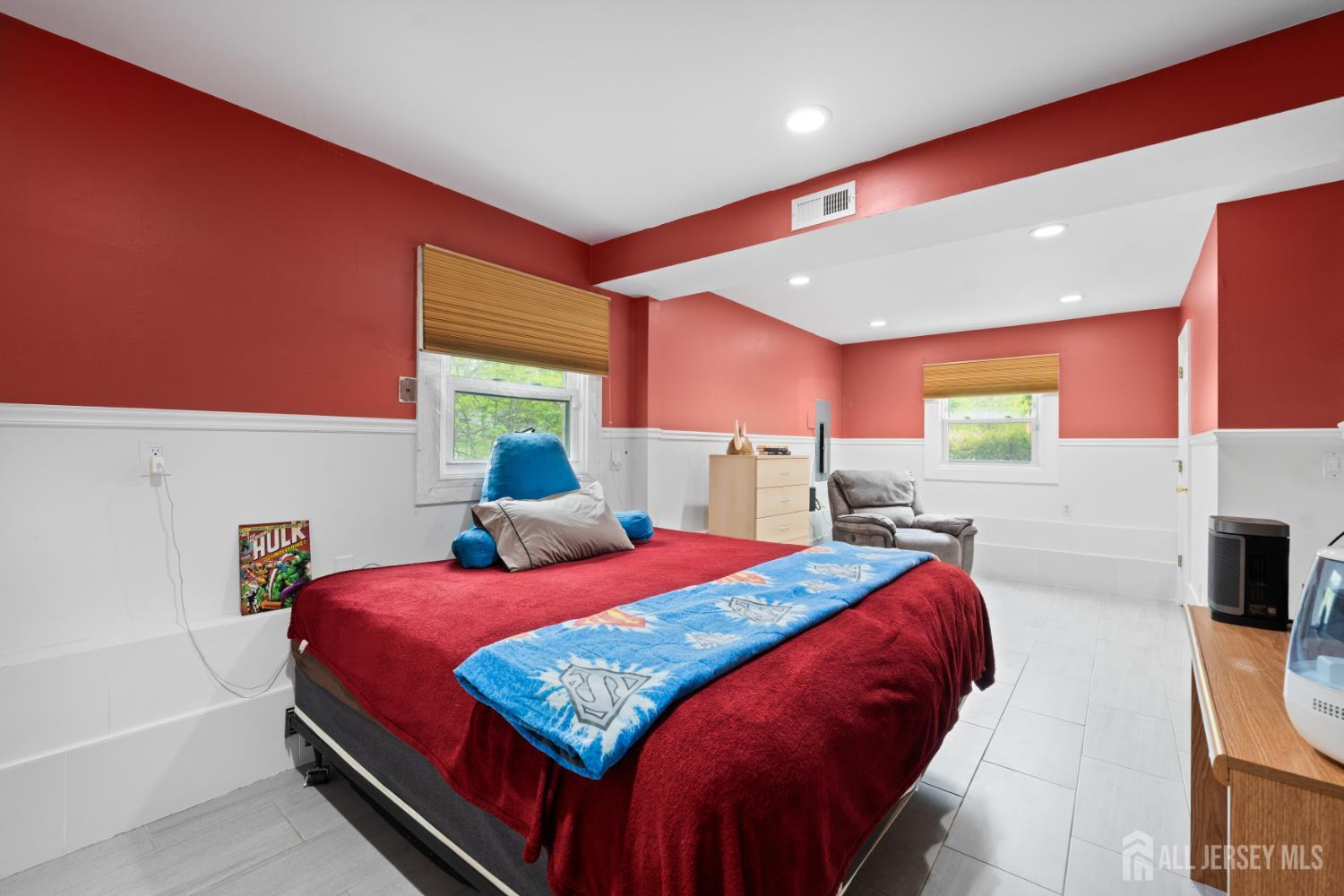 13 Fishel Road Edison, NJ 08820 - Photo 22 of 31 a bedroom with a bed and a flat screen tv