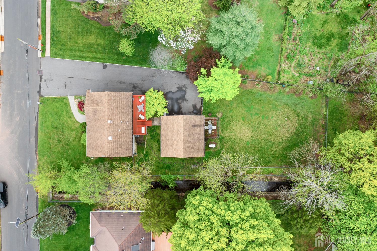 13 Fishel Road Edison, NJ 08820 - Photo 30 of 31 an aerial view of a house with a yard