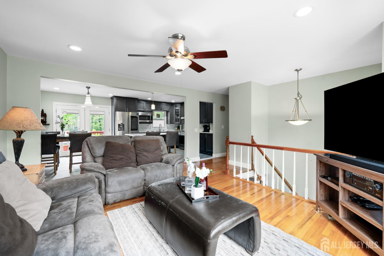 13 Fishel Road Edison, NJ 08820 - Photo 6 of 31 a living room with furniture and a flat screen tv