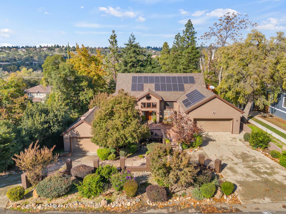 408 Sutter Street Folsom, CA 95630 - Photo 2 of 73 a view of a house with a yard and garden