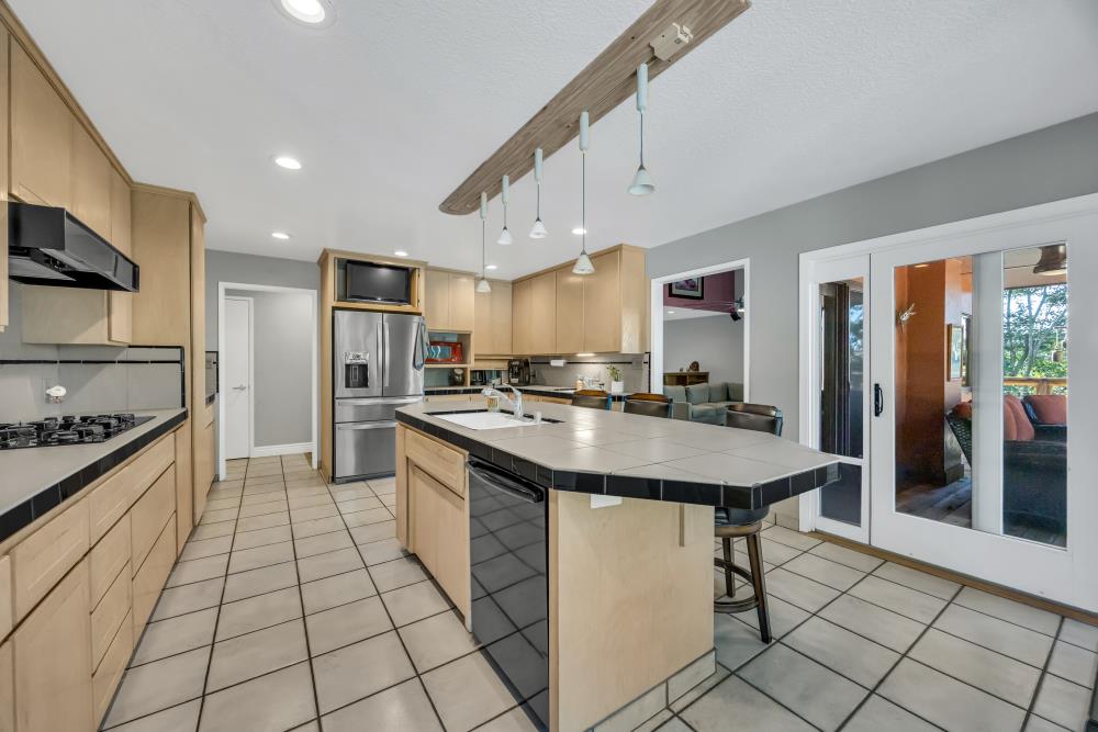 408 Sutter Street Folsom, CA 95630 - Photo 24 of 73 a kitchen with stainless steel appliances granite countertop a sink stove top oven and cabinets