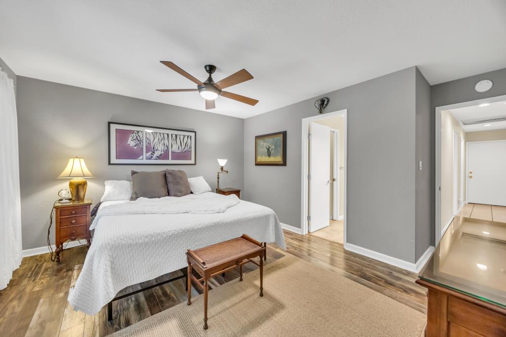 408 Sutter Street Folsom, CA 95630 - Photo 29 of 73 a bedroom with a bed a desk and chair