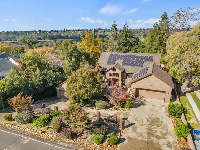 a view of a house with a lake view