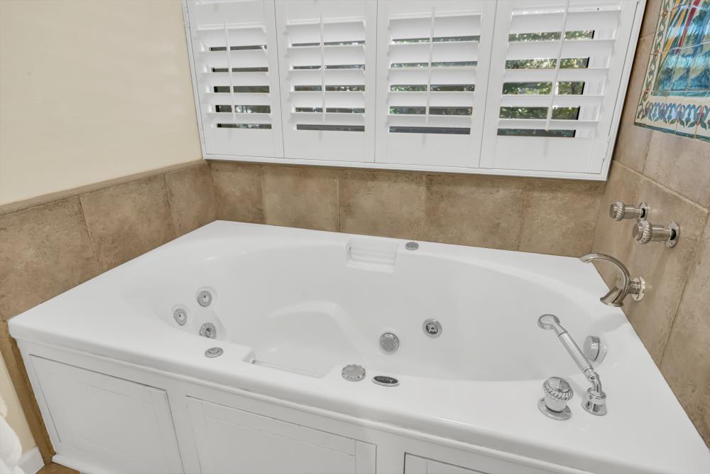 408 Sutter Street Folsom, CA 95630 - Photo 32 of 73 a bathroom with a bathtub