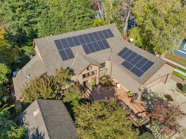 a view of an outdoor sitting area with furniture