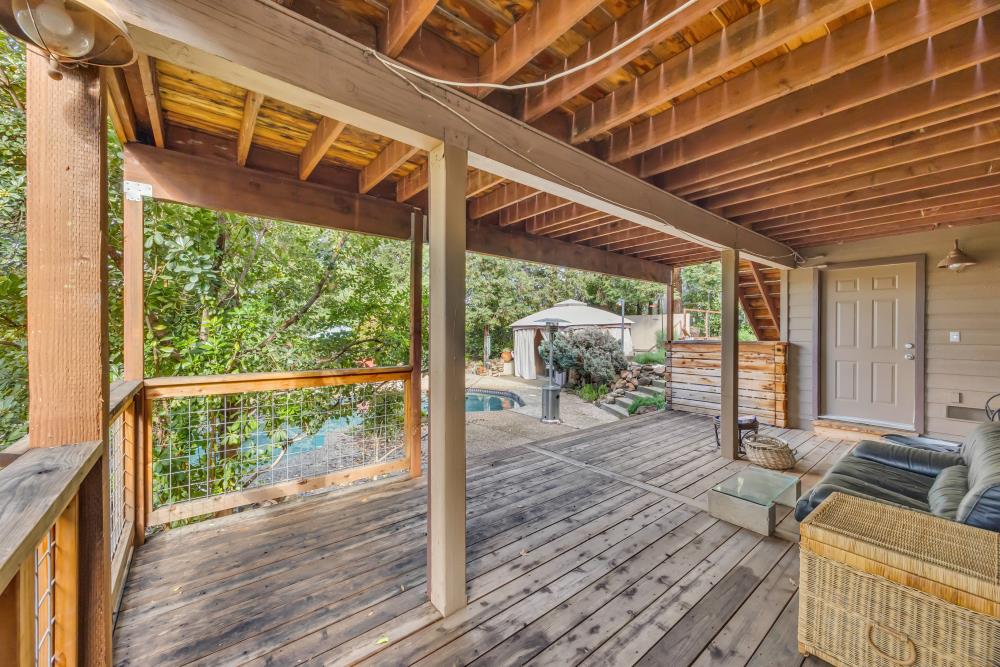 408 Sutter Street Folsom, CA 95630 - Photo 61 of 73 a backyard of a house with wooden floor and outdoor seating