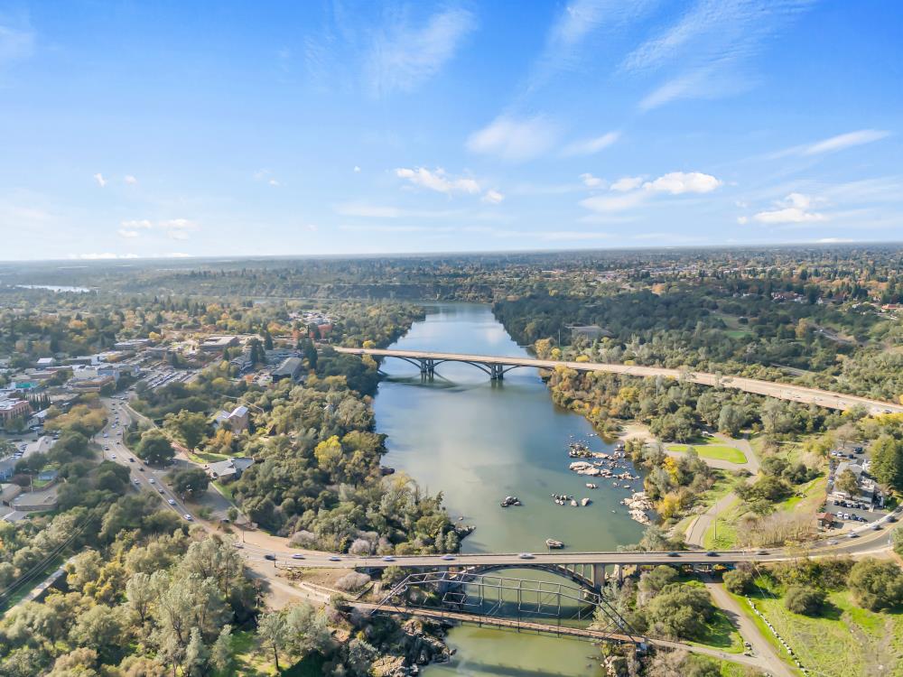 408 Sutter Street Folsom, CA 95630 - Photo 72 of 73 an aerial view of a house with a lake view