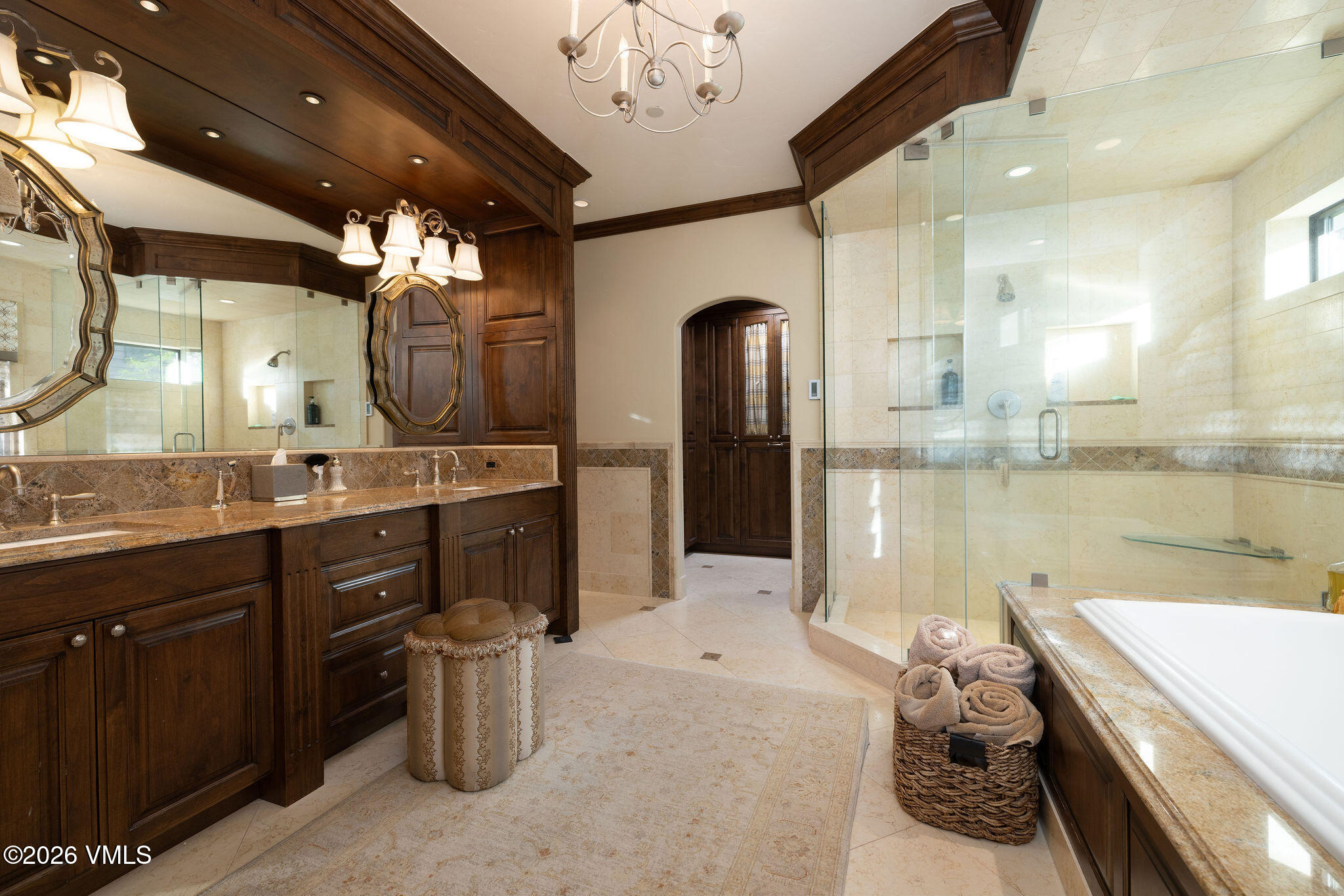 102 Saddle Ridge Loop Edwards, CO 81632 - Photo 12 of 29 a spacious bathroom with a sink a large mirror and a shower