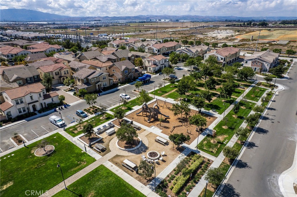 2845 East Berry Loop Privado, Unit 33 Ontario, CA 91761 - Photo 16 of 17 an aerial view of multiple house