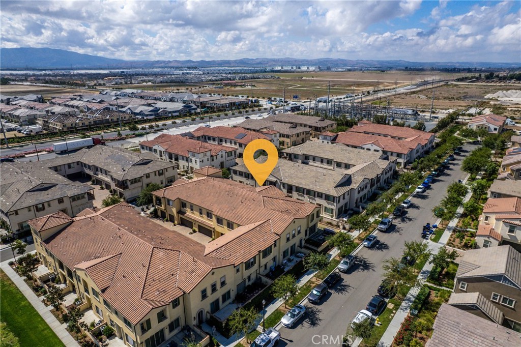 2845 East Berry Loop Privado, Unit 33 Ontario, CA 91761 - Photo 17 of 17 an aerial view of a city with ocean view