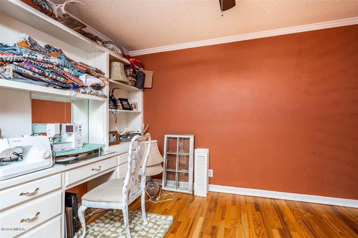 2985 Graham Road Gray, GA 31032 - Photo 16 of 30 a room with a wooden floor and a sink