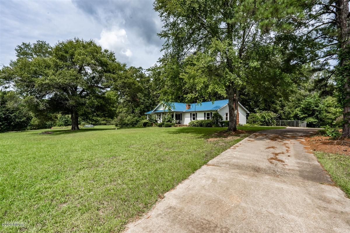 2985 Graham Road Gray, GA 31032 - Photo 21 of 30 a front view of a house with a yard