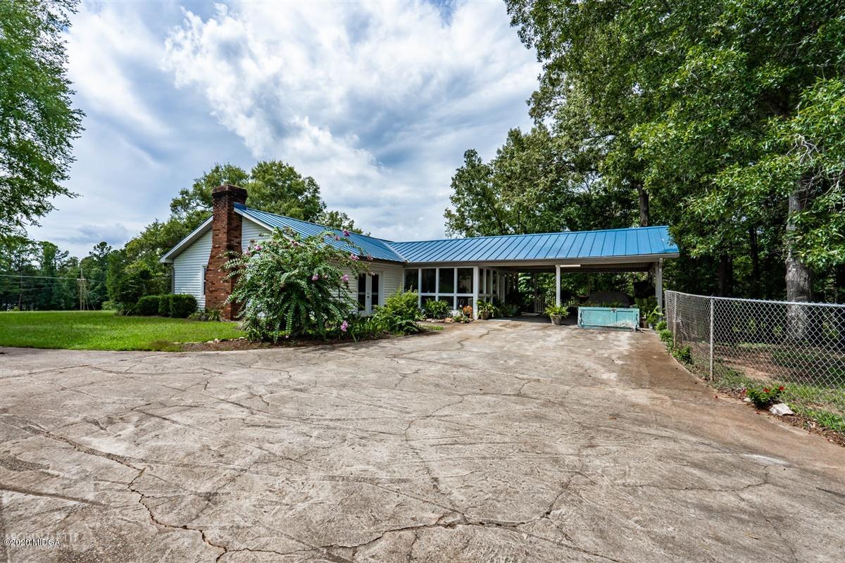 2985 Graham Road Gray, GA 31032 - Photo 24 of 30 a front view of a house with garden