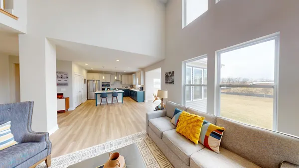 a living room with furniture and a table