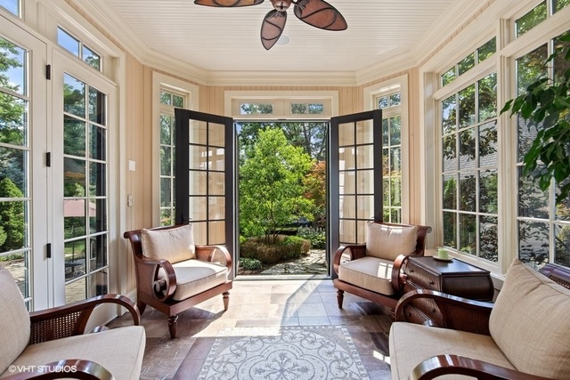 561 Walker Road Hinsdale, IL 60521 - Photo 16 of 41 a living room with furniture and a large window