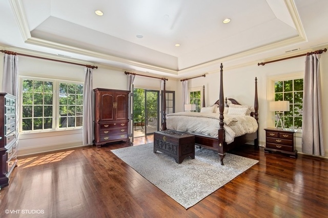 561 Walker Road Hinsdale, IL 60521 - Photo 18 of 41 a living room with furniture large window and wooden floor