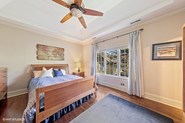 561 Walker Road Hinsdale, IL 60521 - Photo 21 of 41 a bedroom with a bed and a window