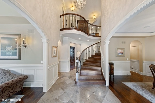 561 Walker Road Hinsdale, IL 60521 - Photo 4 of 41 a view of entryway and hall with wooden floor