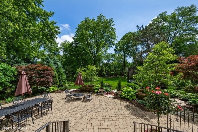 561 Walker Road Hinsdale, IL 60521 - Photo 31 of 41 a view of a backyard with sitting area