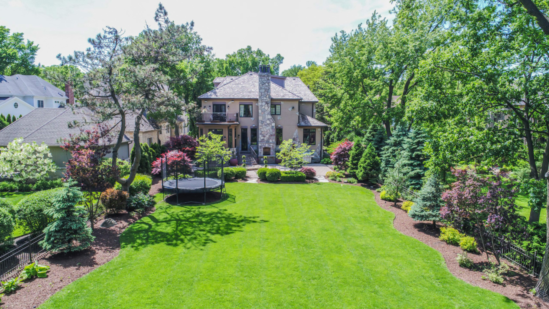 561 Walker Road Hinsdale, IL 60521 - Photo 32 of 41 a view of a house with a big yard and potted plants