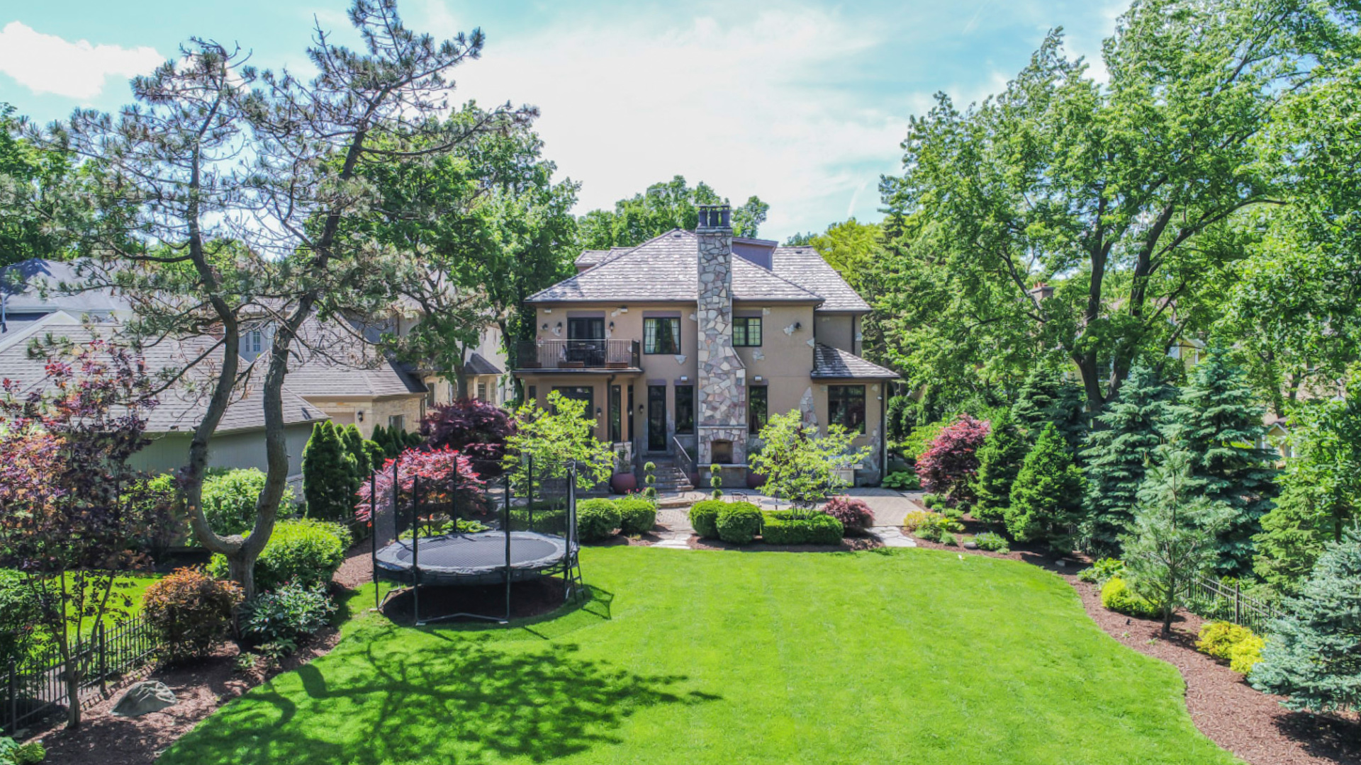 561 Walker Road Hinsdale, IL 60521 - Photo 33 of 41 a view of a house with a big yard and potted plants