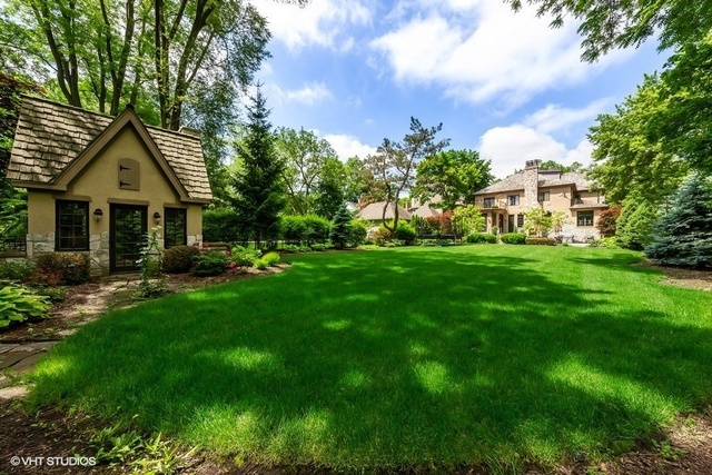 561 Walker Road Hinsdale, IL 60521 - Photo 37 of 41 a front view of a house with a yard