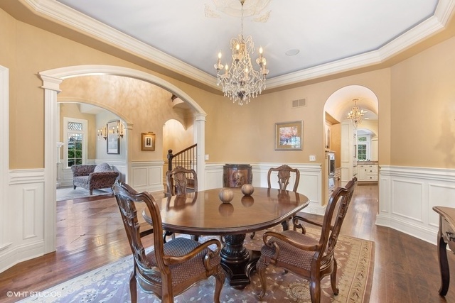 561 Walker Road Hinsdale, IL 60521 - Photo 10 of 41 a view of a dining room with furniture and a chandelier