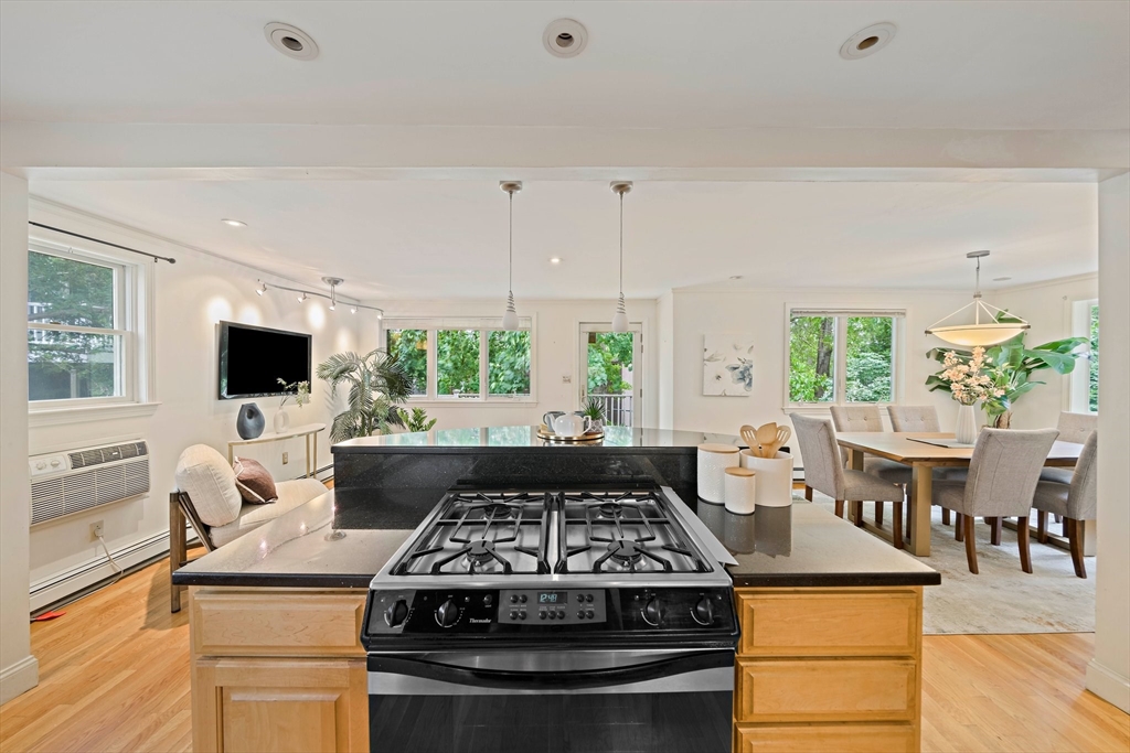 34 Wayburn Road Boston, MA 02130 - Photo 16 of 35 a stove top oven sitting inside of a kitchen
