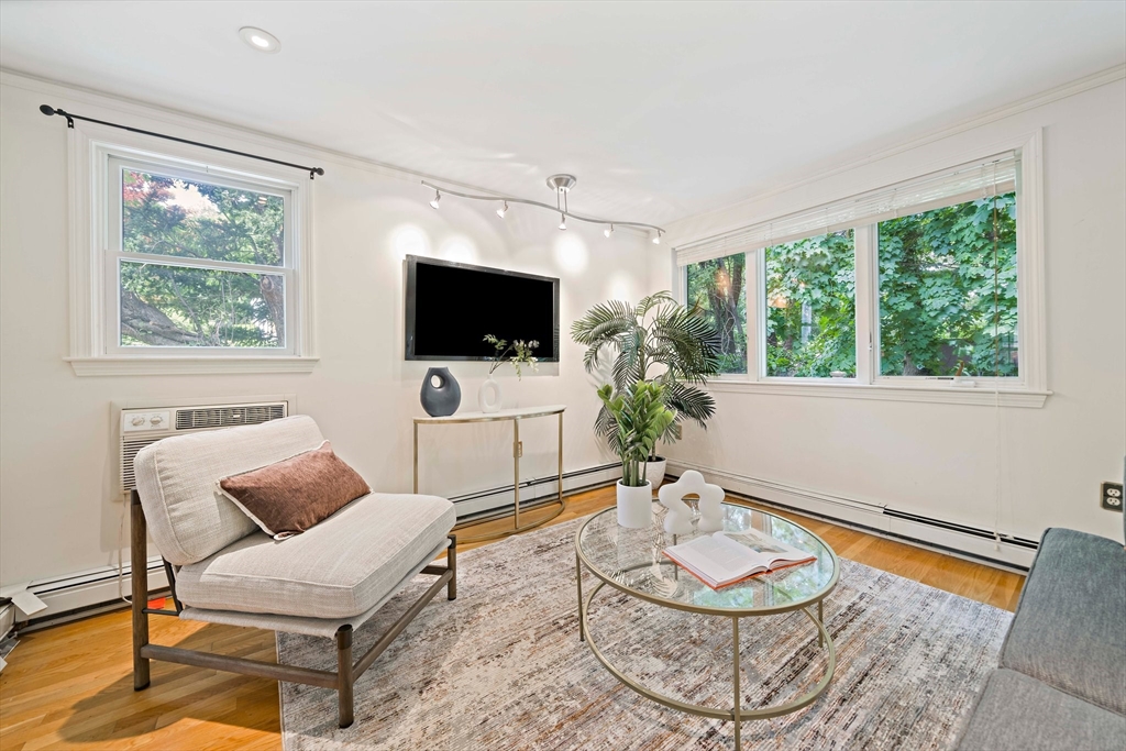 34 Wayburn Road Boston, MA 02130 - Photo 20 of 35 a living room with furniture and a flat screen tv