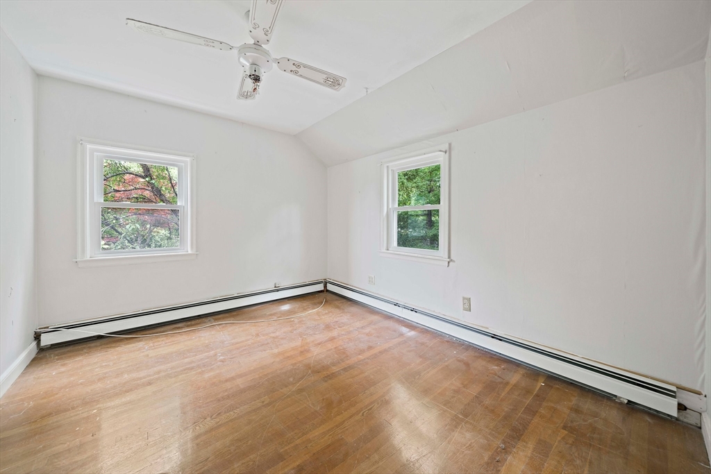 34 Wayburn Road Boston, MA 02130 - Photo 30 of 35 an empty room with windows and fan view