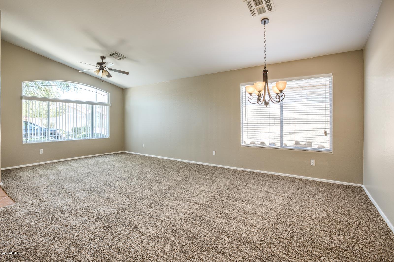 11021 West Granada Road Avondale, AZ 85392 - Photo 2 of 12 Living_ Dining Room