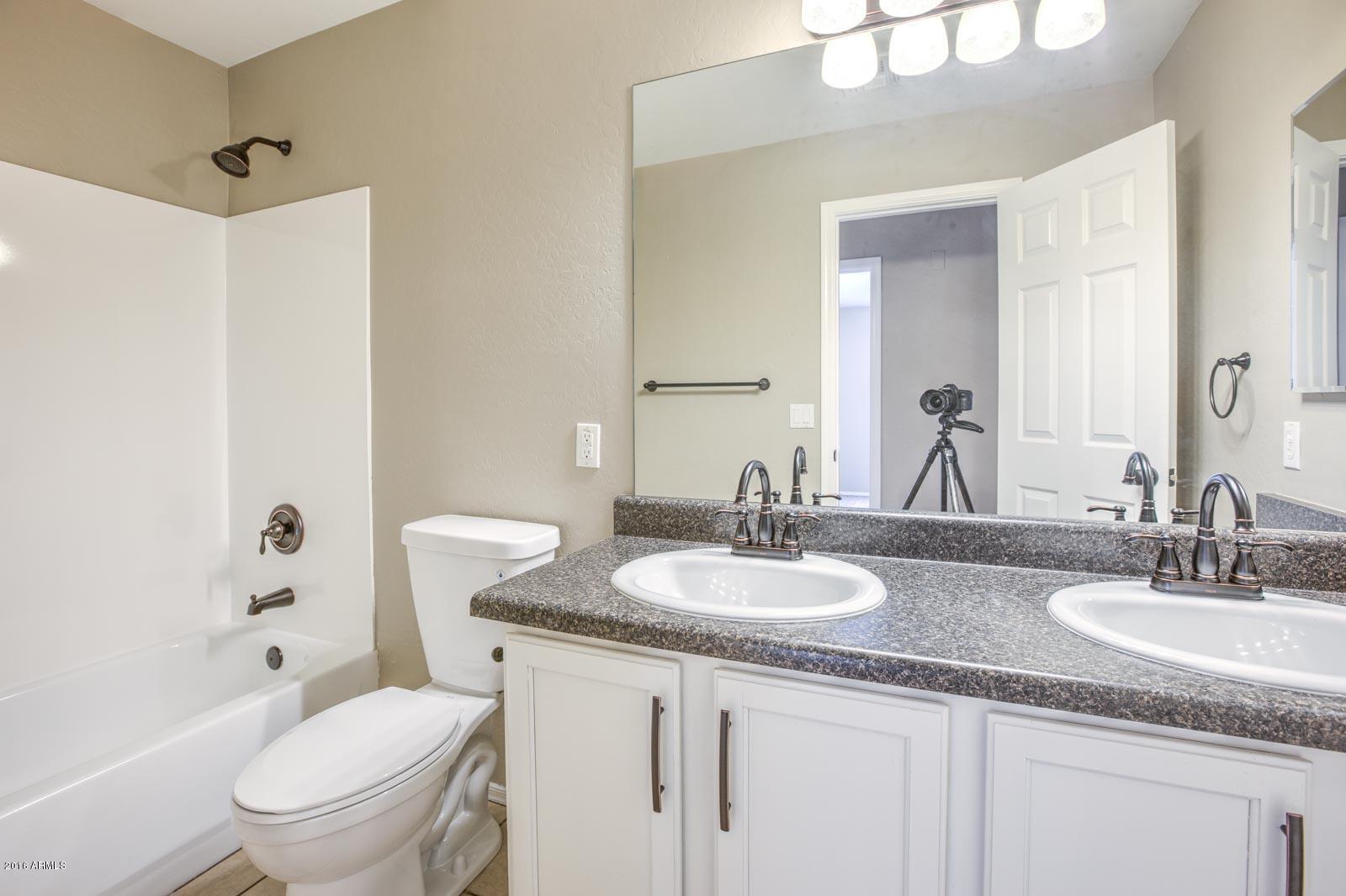 11021 West Granada Road Avondale, AZ 85392 - Photo 9 of 12 Hall Bathroom