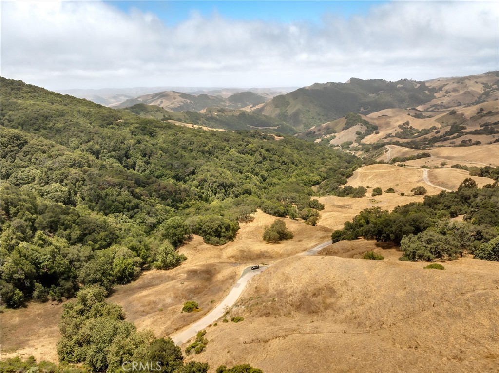 9500 Santa Rosa Creek Road Cambria, CA 93428 - Photo 35 of 58 a view of a field with mountains in the background