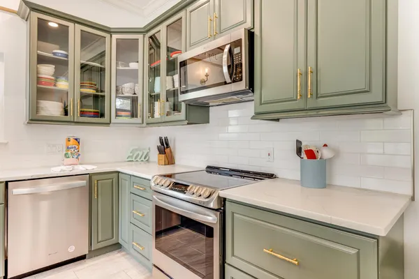 a bedroom with a bed and a chair