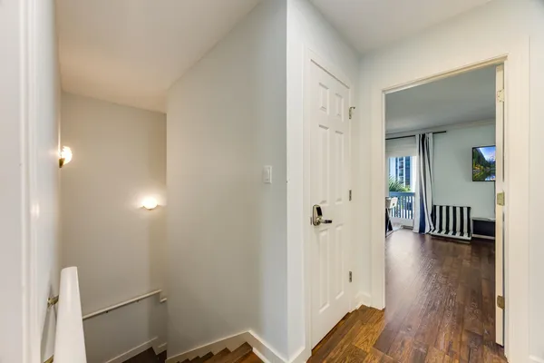 a bathroom with a shower sink and mirror