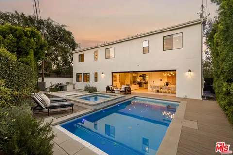 a front view of house with outdoor space