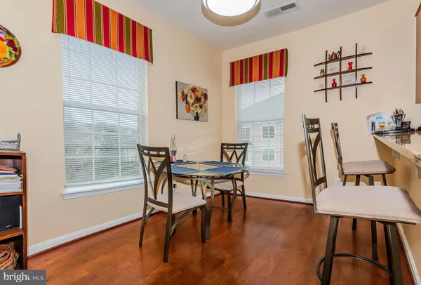 a bedroom with bed and a chandelier