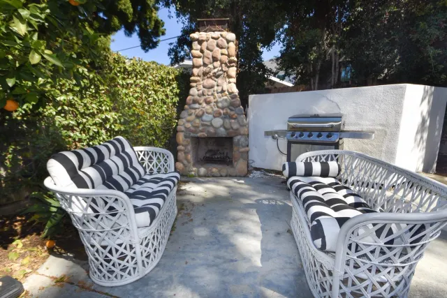 a view of a couches with wooden floor