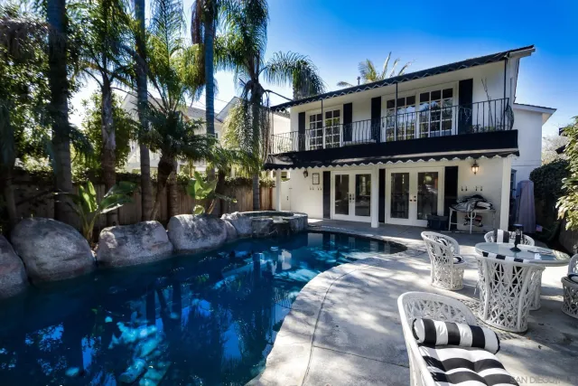 a view of house with patio outdoor seating