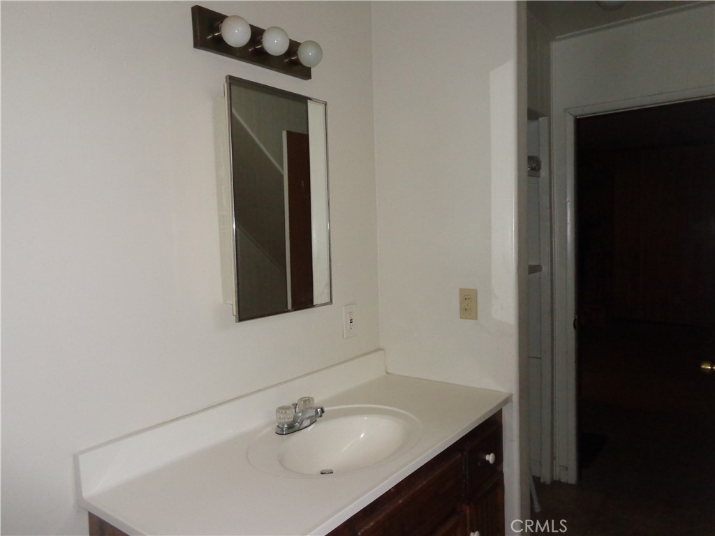 1021 Coulter Pine Road Crestline, CA 92325 - Photo 14 of 31 Bathroom sink downstairs