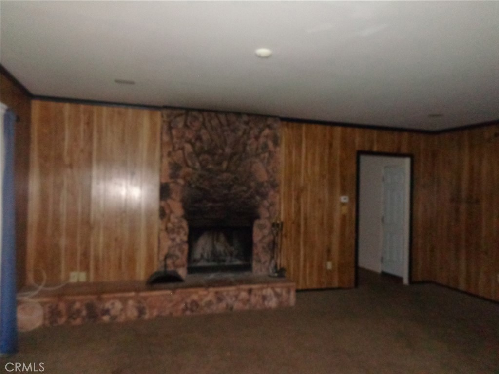 1021 Coulter Pine Road Crestline, CA 92325 - Photo 5 of 31 Living room fireplace