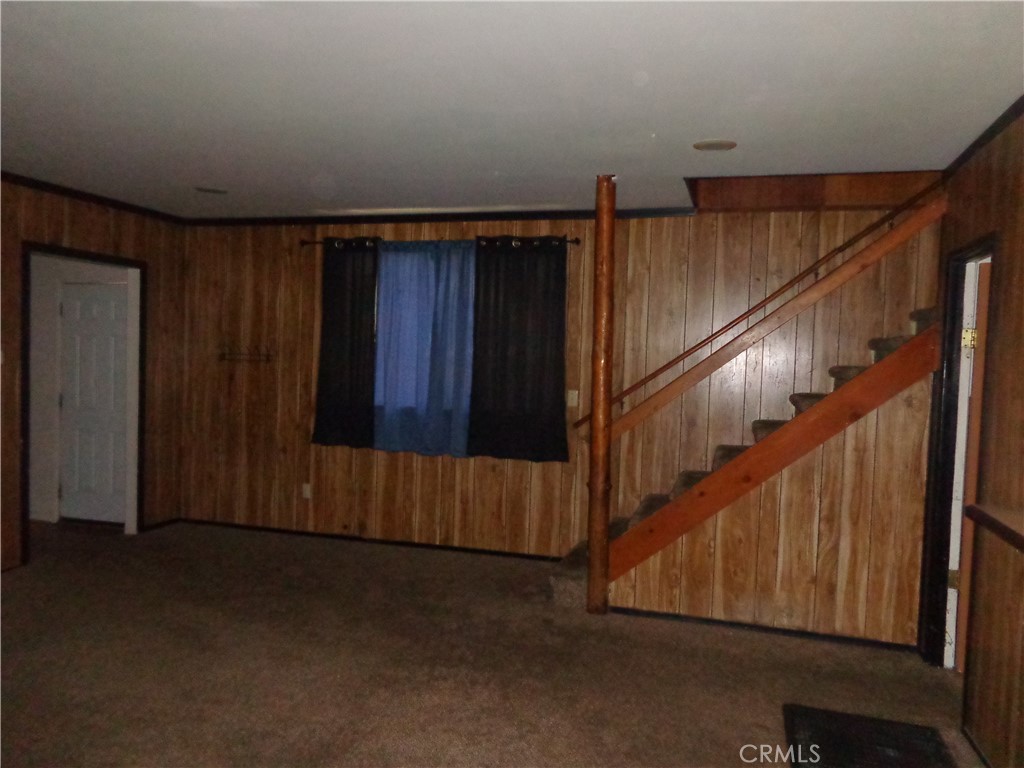 1021 Coulter Pine Road Crestline, CA 92325 - Photo 6 of 31 Living room and stairs